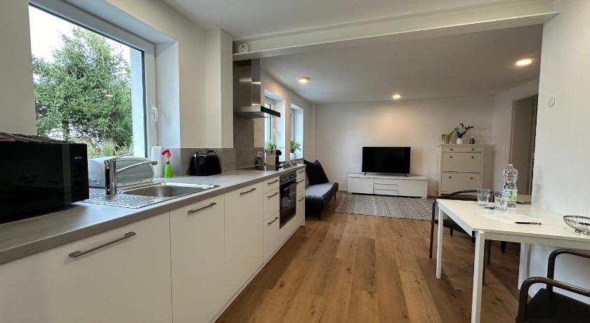 Modernes Apartment mit eigener Terrasse & Garten