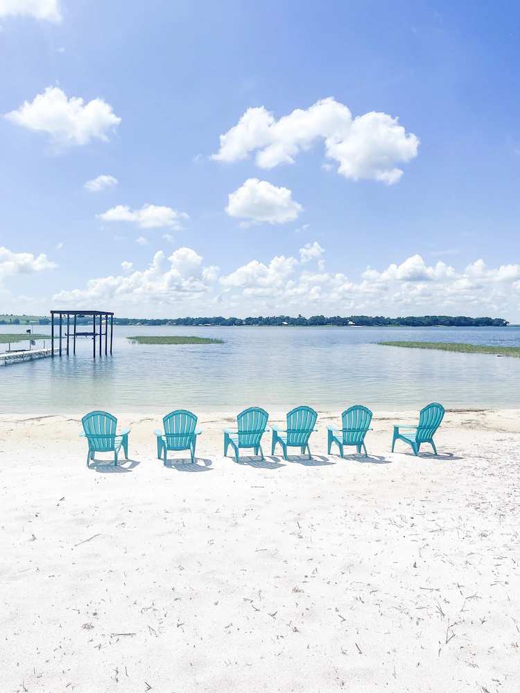 Beautiful home with white sand beach on stunning Crooked Lake