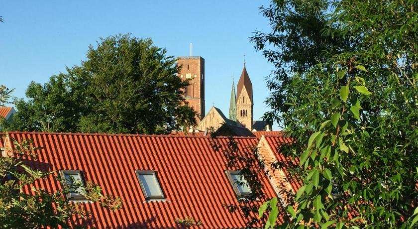 Selvbetjent lejlighed i centrum ved åen